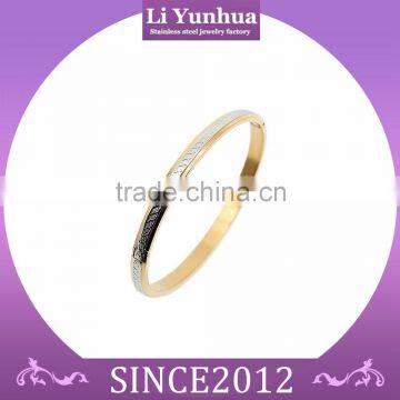 Stainless steel jewelry gold platedl atest design vogue round bangle