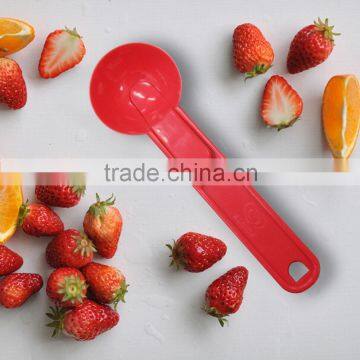 Plastic ice cream scoop with a pop-up handle