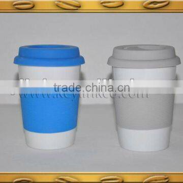 porcelain travel mug with silicon lid and band