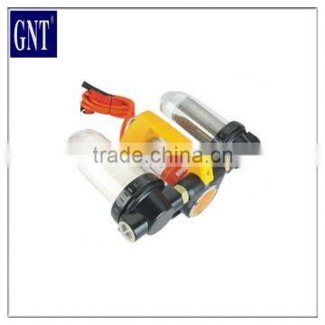 Excavator with double filter fuel transfer pump