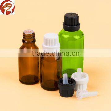 Essential oil glass bottle with tamper evident plastic cap