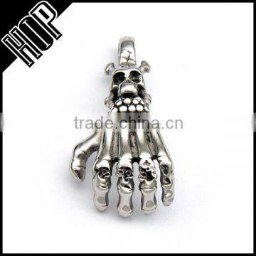 Best selling fashion stainless steel vintage skull hand pendant