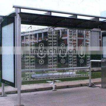High Quality Stainless Steel Bus Stop Shelter in Good Design with a Pattern of Toughened Glassand Light Box for Public Equipment