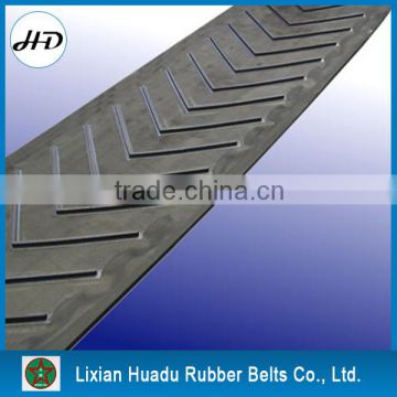 Patterned conveying belt, rubber V belting