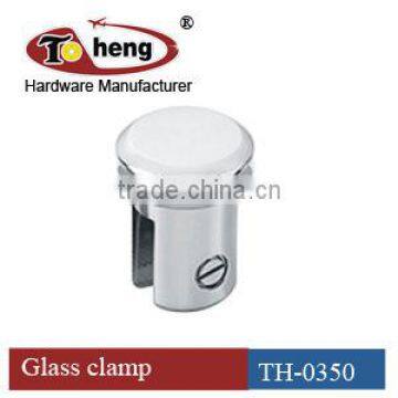 Shower door glass clamp