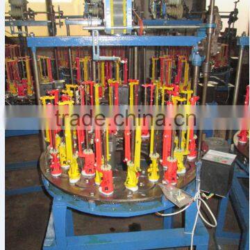 Elastic cord braiding machine