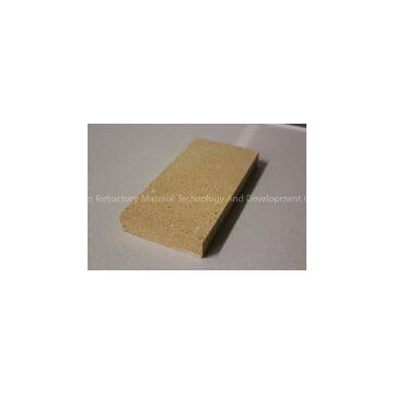 Dense silica refractory brick for glass furnace