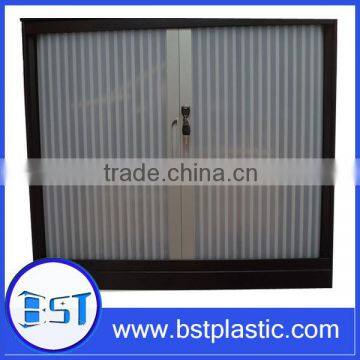 Plastic rolling shutter for cabinet door