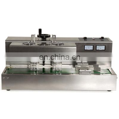 Continuous electromagnetic aluminum foil sealing machine bottle cap sealer