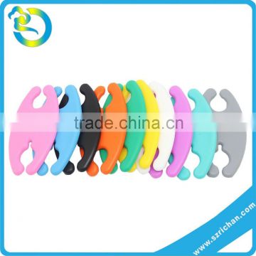 wholesale fashion shape earphone silicone rubber soft earphone cord organizer