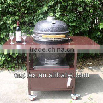 Holland Clay charcoal egg bbq grill with brown iron table