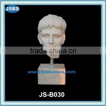 carved marble human bust statue