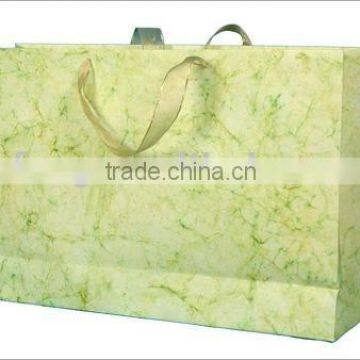 Yellow ribbon handle gift paper bag