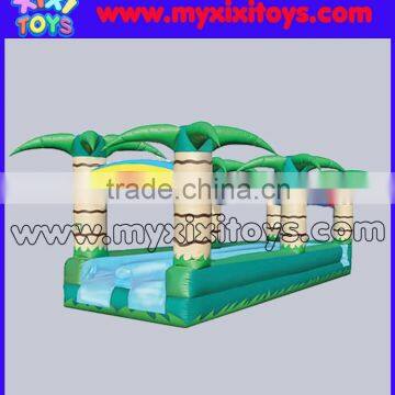 Tropical palm tree inflatable slip and slide