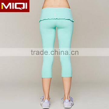 Female gym wear compression yoga pants with high fold over waist, fashion leggings