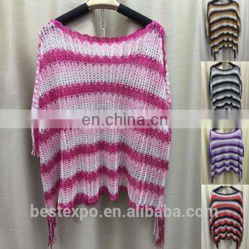 2017 latest designs top short sleeve knitted hollow out poncho with fringe girls blouse