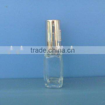 Clear glass nail polish bottles with gold yellow cap