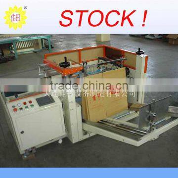 Full automatic carton erector with bottom sealer
