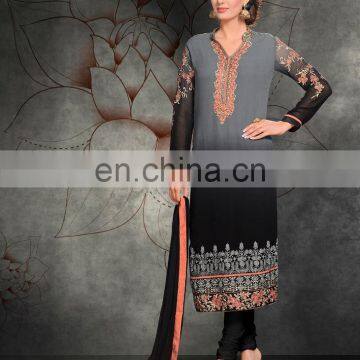 Grey and black colored georgette suit.