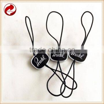 Metal string tag for clothing