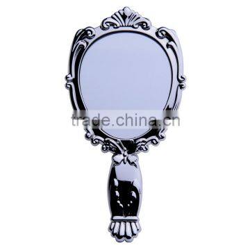 antique style plastic hand mirror