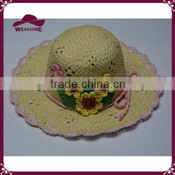 Girls beige woven paper straw hat with hand made flowers