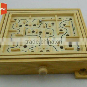 kid wooden maze or labyrinth game toy with iron balls