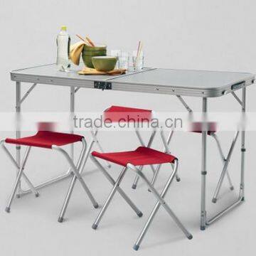 Folding table and chairs for camping.