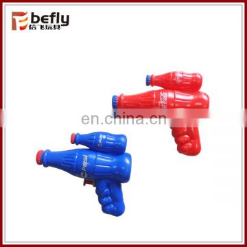 Small plastic cola water gun