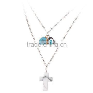 Double chain cross pendant turquoise and hamsa hand charms necklace