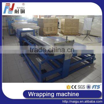 China Foshan NaiGu Manufacturer 2016 Semi-automatic Mattress Roll Packaging Machine photo-5