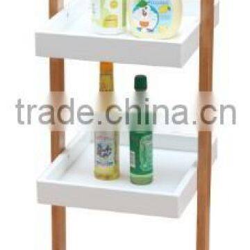 bathroom rack with three boxes