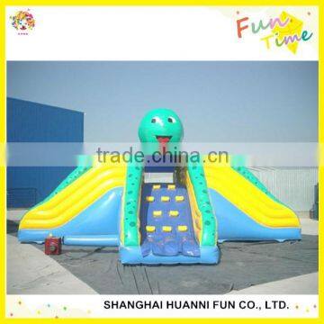 Newly design gaint Customized PVC 0.55mm adults inflatable water slide with climbing wall price