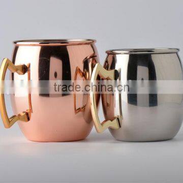 copper color Moscow Mule with gold color handle