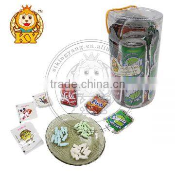 Cola bottle shaped compressed fizzy hard candy with tatoo paper