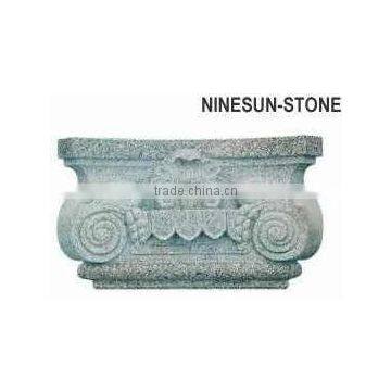 Carved granite column capital