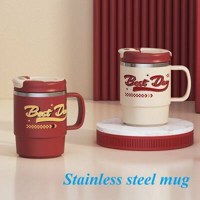 Stainless steel mug with spoon and tea strainer