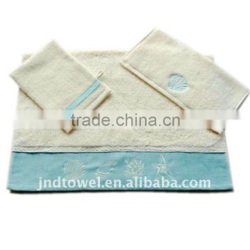 promotional towel set with lace and seashell ebmrodiery in satin