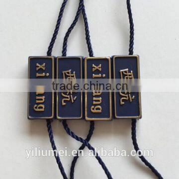 2016 high quality custom golden hang tag plastic string/hanging tablets for clothing