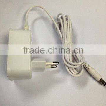 China Manufacturer power adapter ac dc 9V 5 volt 1A 2a plug in router charger                        
                                                                                Supplier's Choice