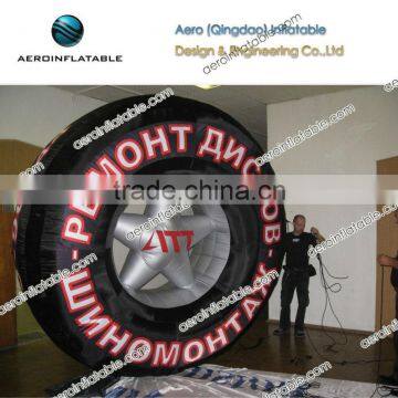 Large inflatable advertising tire with logo