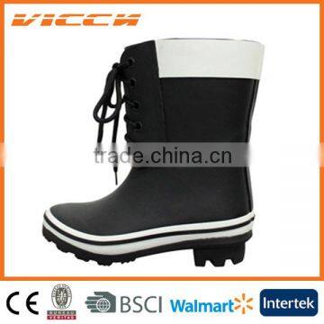 white cuff black rubber rain boots