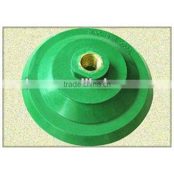 Abrasive rubber backing pad