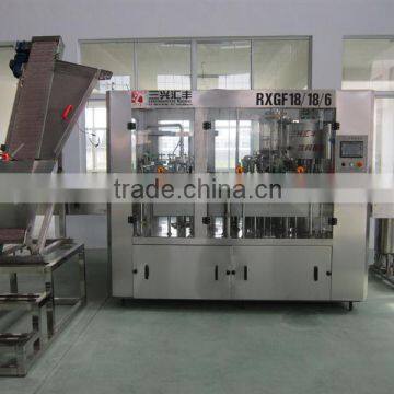 SXHF hot sell automatic glass bottle juice filling machinery, monoblock 3 in 1 juice filling machinery, beverage machinery