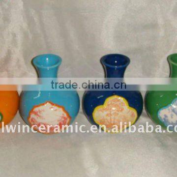 Ceramic color glazed vases with spot decalled