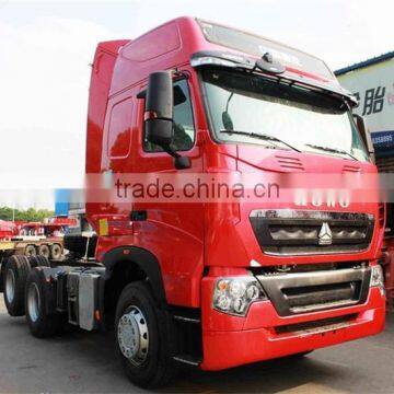 SINOTRUK HOWO T7H 6X2 440HP Euro4 MAN Engine Tractor Head Truck With Rear Axle Lifting photo-2
