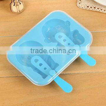 A molded ice box /jingle cats shape ice mold