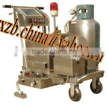 Concrete road crack sealer machine