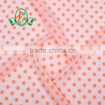 Knitted elastic dot mesh flock fabric