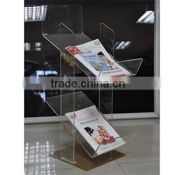 Clear acrylic wall mounted magazine rack